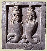 Серапис-Дионисий и Исида. Стела из известняка. 1 в. до н.э. Британский музей